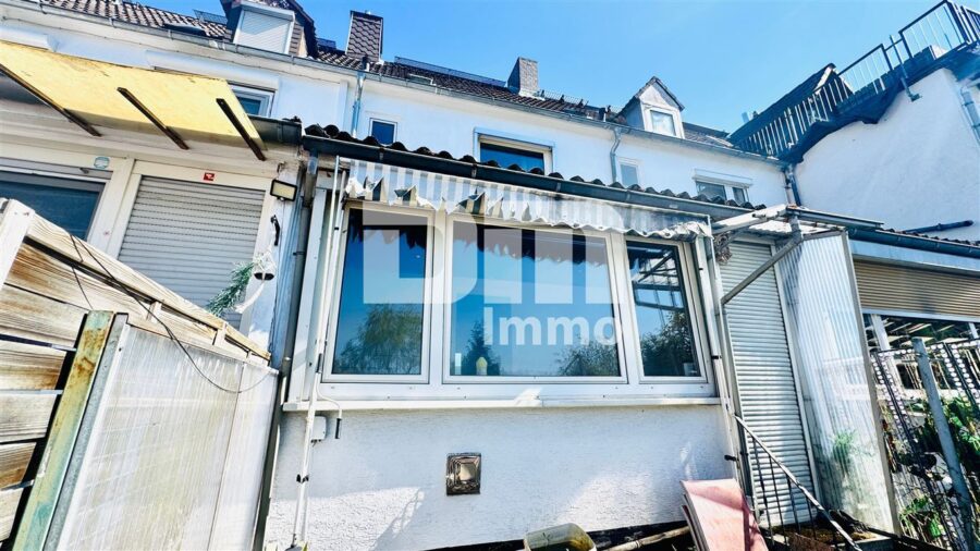(R)eserviert! Kompaktes Reihenhaus in exponierter Lage mit Garten - Rückansicht